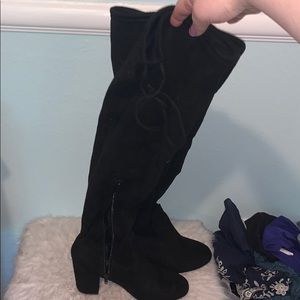 Thigh high black boots